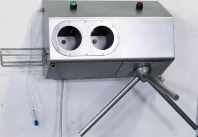 Hand disinfection station with turnstile